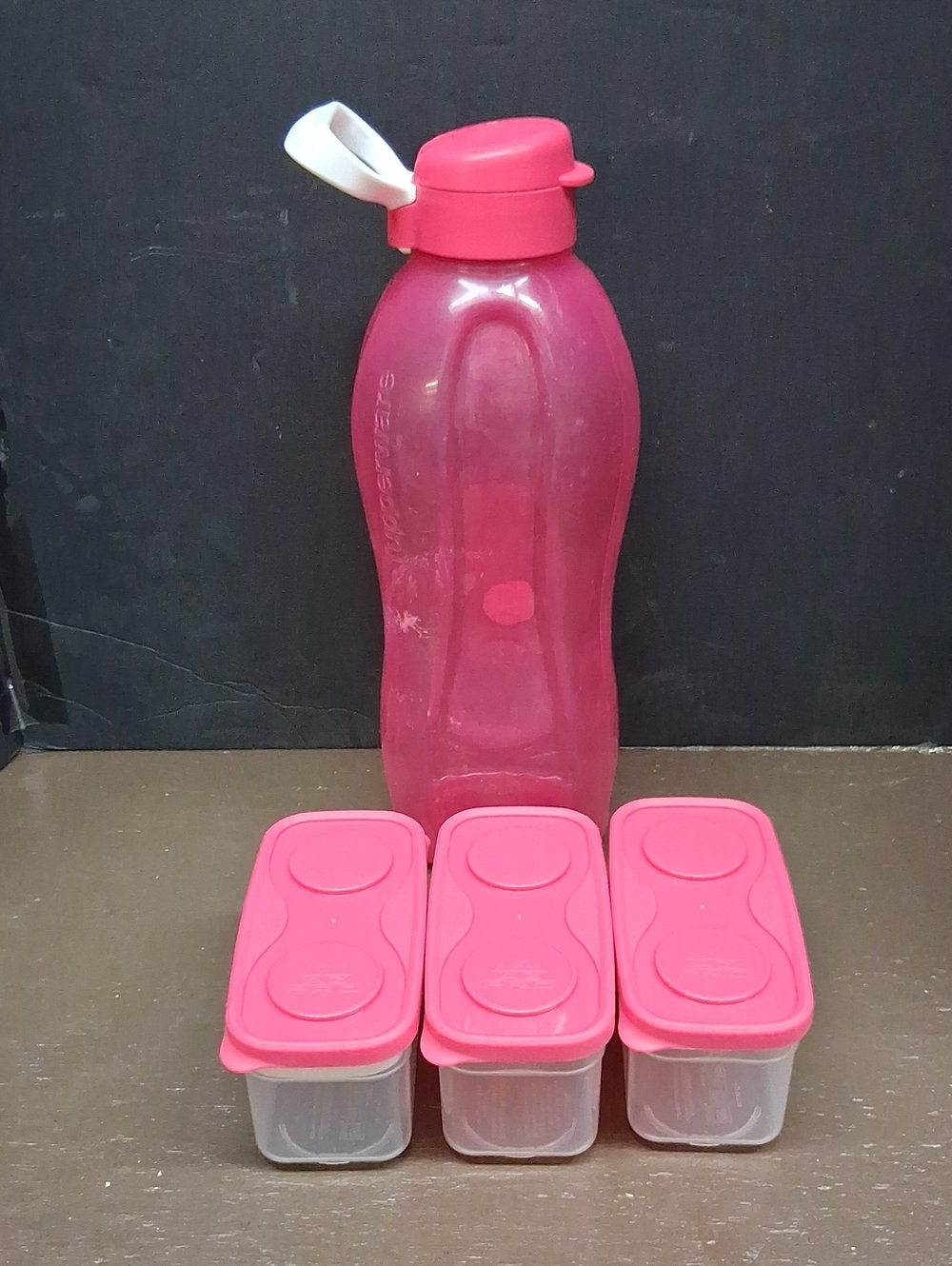 Tupperware‎ 64 oz.drink bottle, and 3 AZ Pro High Performance lunch containers